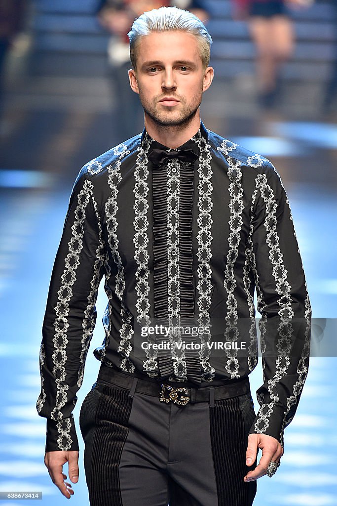 Marcus Butler walks the runway at the Dolce Gabbana show during