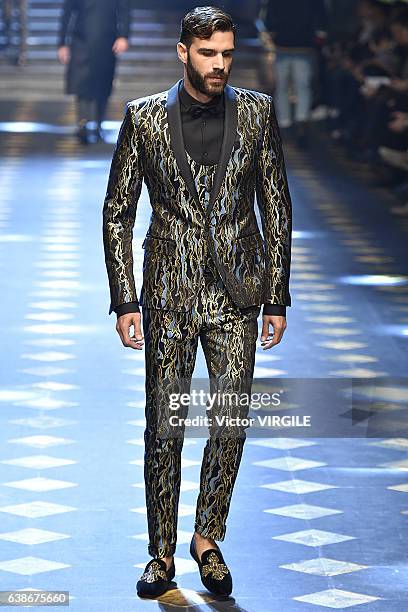 Christian Bendek walks the runway at the Dolce & Gabbana show during Milan Men's Fashion Week Fall/Winter 2017/18 on January 14, 2017 in Milan, Italy.