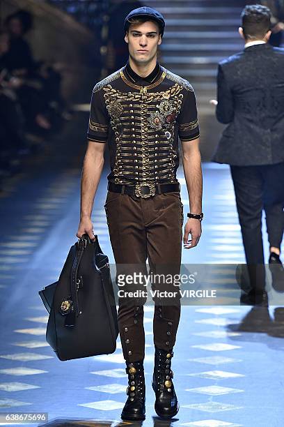Model walks the runway at the Dolce & Gabbana show during Milan Men's Fashion Week Fall/Winter 2017/18 on January 14, 2017 in Milan, Italy.