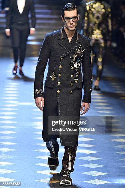 Model walks the runway at the Dolce & Gabbana show during Milan Men's Fashion Week Fall/Winter 2017/18 on January 14, 2017 in Milan, Italy.