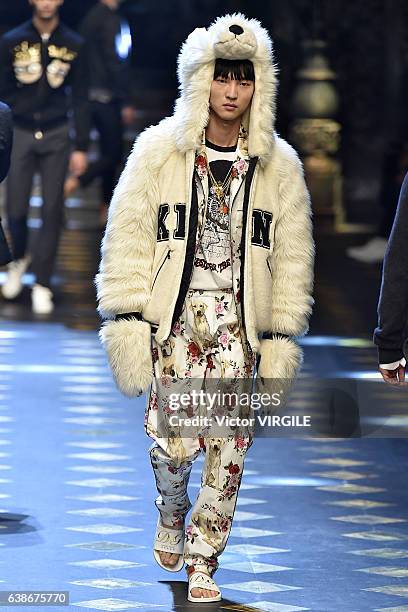 Model walks the runway at the Dolce & Gabbana show during Milan Men's Fashion Week Fall/Winter 2017/18 on January 14, 2017 in Milan, Italy.