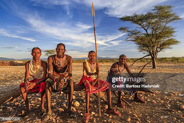 african warriors from samburu tribe, central kenya, east africa - masai stock pictures, royalty-free photos & images