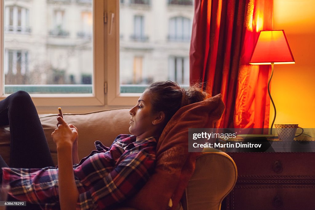 Young woman spending the weekend at home