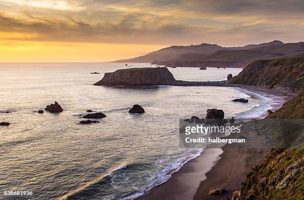 sunset over goat rock, northern california - sonoma stockfoto's en -beelden