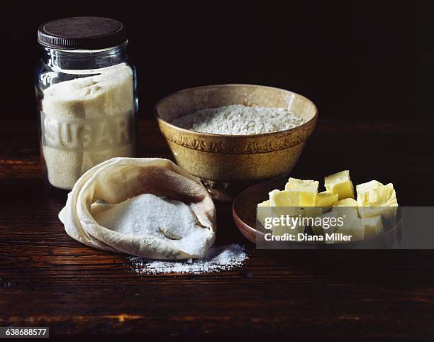 flour, sugar and butter on wooden surface - sugar jar stock pictures, royalty-free photos & images