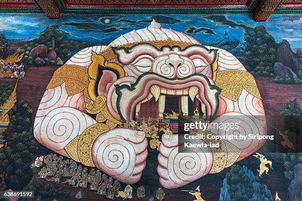 mural scene of the ramayana surrounding on the wall in wat phra kaew, bangkok, thailand. - monkey god stock pictures, royalty-free photos & images