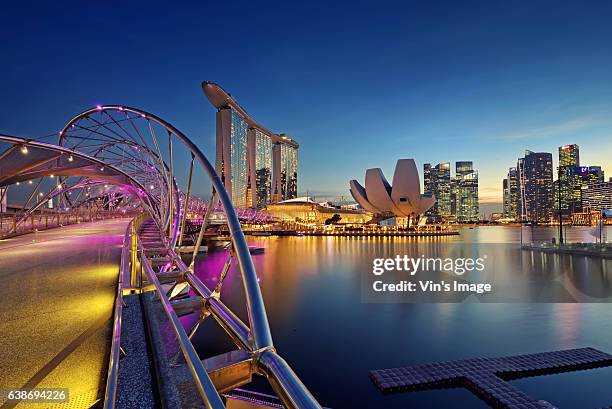 the helix bridge and cdb - cdb stock pictures, royalty-free photos & images