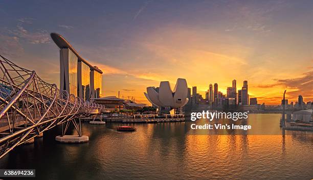 the helix bridge and cdb - cdb stock pictures, royalty-free photos & images