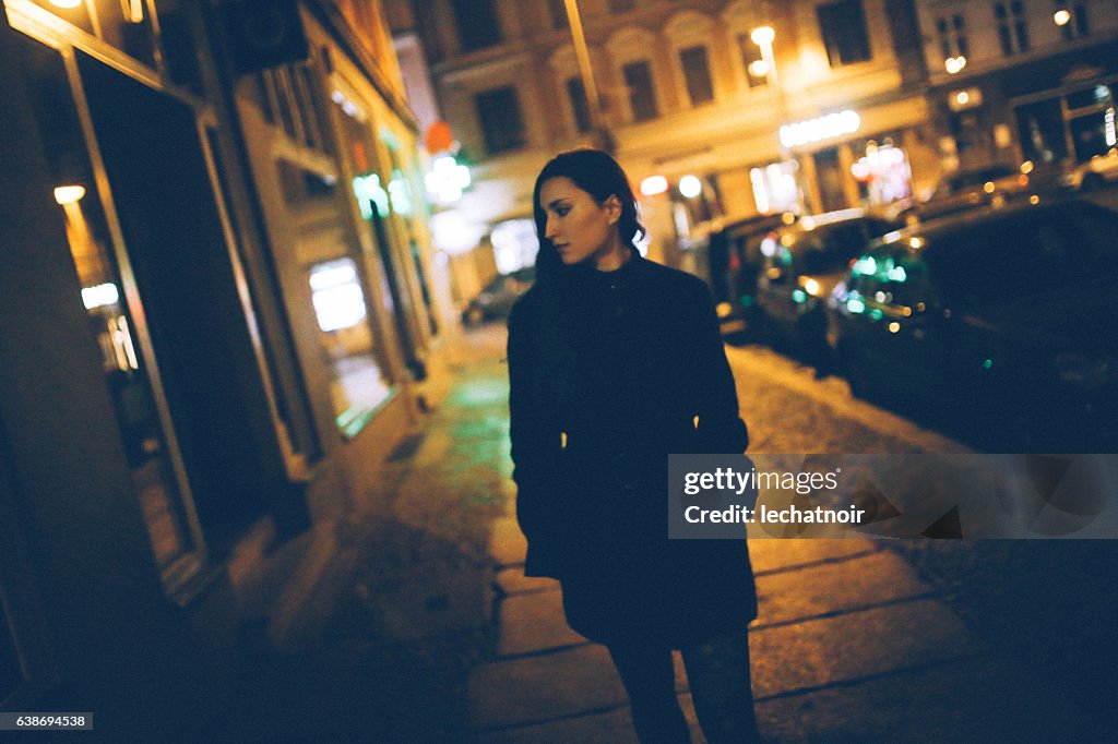 Young woman walking in Berlin Mitte