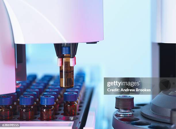 gas chromatography separating vials of complex compound mixtures into individual components - chromatography stock pictures, royalty-free photos & images