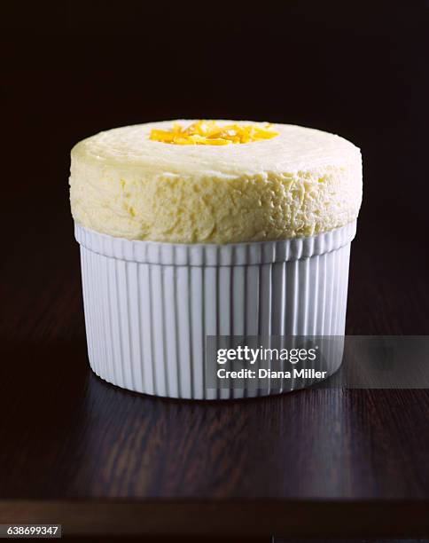 lemon souffle in ramekin - souffle stock pictures, royalty-free photos & images