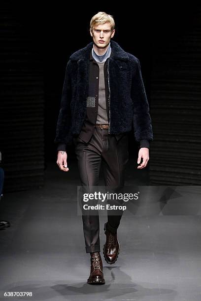 Model walks the runway at the Salvatore Ferragamo designed by Massimiliano Giornetti show during Milan Men's Fashion Week Fall/Winter 2017/18 on...