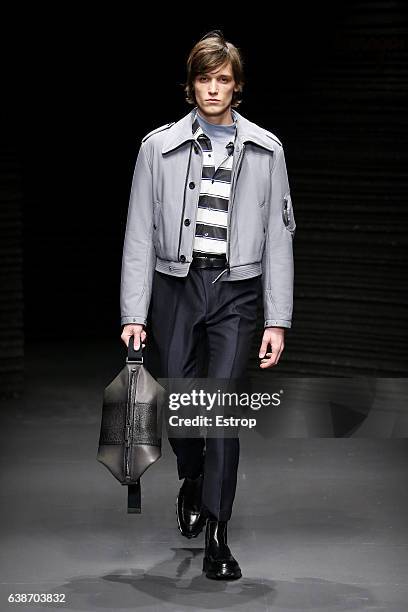 Model walks the runway at the Salvatore Ferragamo designed by Massimiliano Giornetti show during Milan Men's Fashion Week Fall/Winter 2017/18 on...