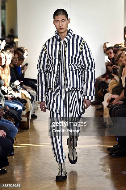 Model walks the runway at the Sunnei designed by Simone Rizzo & Loris Messina show during Milan Men's Fashion Week Fall/Winter 2017/18 on January 15,...