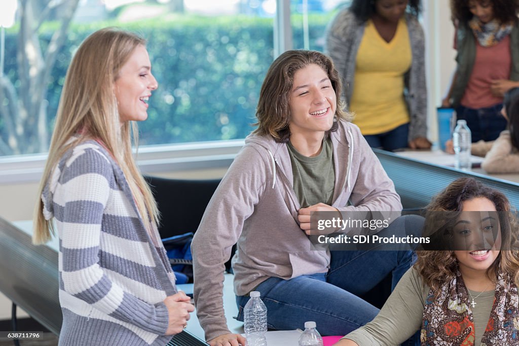 College First Class College Students Talking In Class