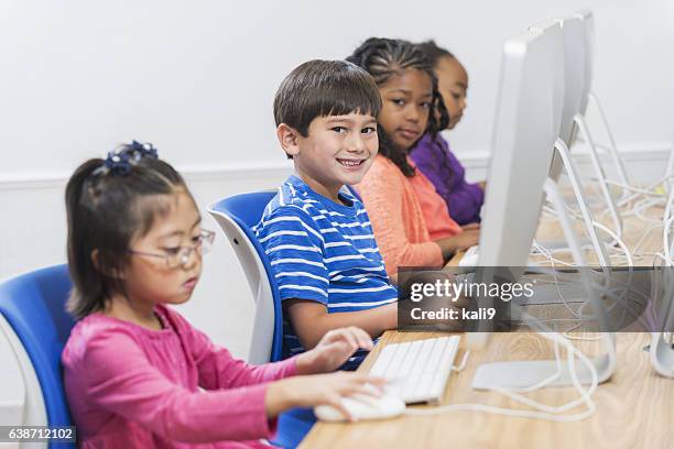 Children Using Monitor Multi Monitor Workstation Photos and Premium High Res Pictures - Getty ...