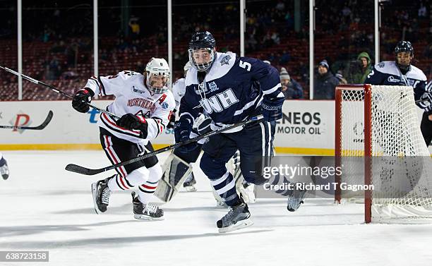 Dylan Chanter of the New Hampshire Wildcats skates against the Northeastern Huskies during NCAA hockey at Fenway Park during "Frozen Fenway" on...