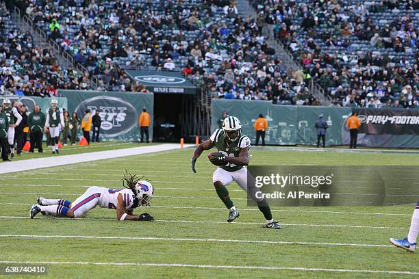 Wide Receiver Quincy Enunwa of the New York Jets has a long gain against the Buffalo Bills at MetLife Stadium on January 1, 2017 in East Rutherford,...