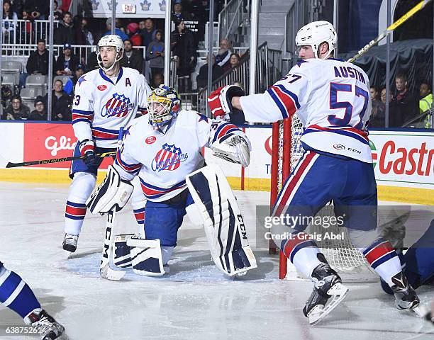 Linus Ullmark protects his crease with help from Tyson Strachan and Brady Austin Rochester Americans against the Toronto Marlies during AHL Game...