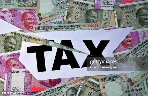 new rupees notes & income tax, india - tax stock pictures, royalty-free photos & images