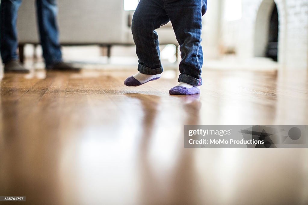 Toddler taking 1st steps