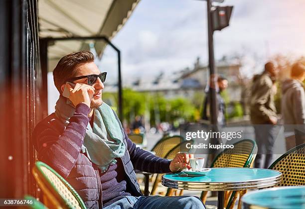 making plans while he's in paris - sassy paris stockfoto's en -beelden