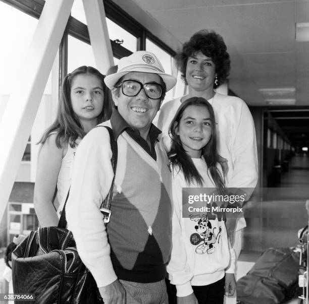 Ronnie Corbett and his wife Anne with children Emma, 13 and Sophie 11 arriving at Heathrow Airport from Los Angeles. 8th April 1980.