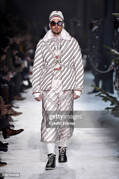 Model walks the runway at the Moncler Gamme Bleu designed by Thom Browne show during Milan Men's Fashion Week Fall/Winter 2017/18 on January 15, 2017...