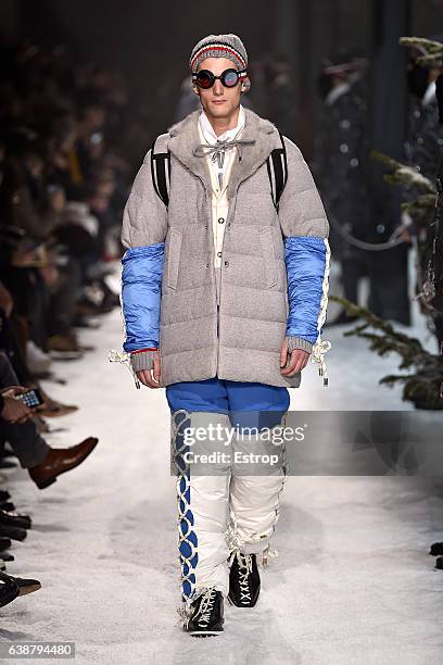 Model walks the runway at the Moncler Gamme Bleu designed by Thom Browne show during Milan Men's Fashion Week Fall/Winter 2017/18 on January 15, 2017...