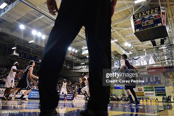 The ball is passed as the La Salle Explorers takes on the George Washington Colonials during the first half at Tom Gola Arena on January 15, 2017 in...