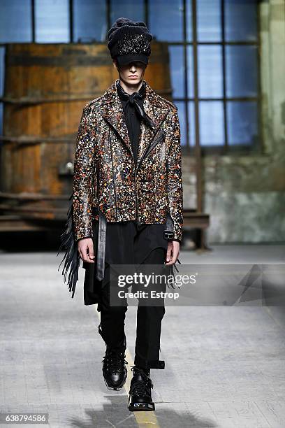 Model walks the runway at the Dsquared2 designed by Dean Caten & Dan Caten show during Milan Men's Fashion Week Fall/Winter 2017/18 on January 15,...