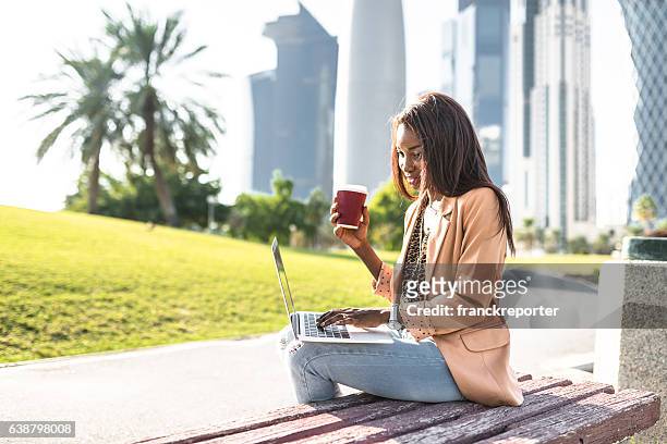 businesswoman on the phone in doha - qatar business stock pictures, royalty-free photos & images