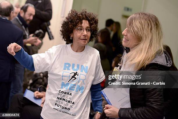 Woman wearing the shirt of the Marathon of Memory together with the marathon runner Franca Fiacconi during a press conference at Palazzo Chigi for...