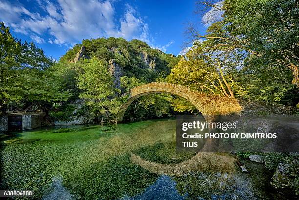 klidhonia's stone bridge - dimitrios tilis stockfoto's en -beelden