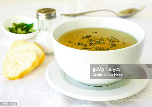 chicken broth - soup vegtables stock-fotos und bilder
