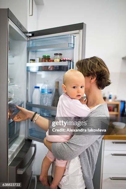 happy family cooking french breakfast together - iakovleva stock pictures, royalty-free photos & images