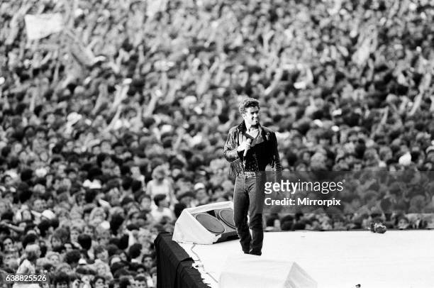 George Michael of pop duo Wham!, at their farewell concert entitled The Final. Wembley Stadium, 28th June 1986.