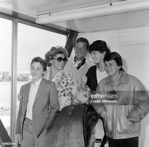 Roger Moore with his wife Luisa and family, daughter Deborah , son Geoffrey and Sacha Newley . They have all arrived from Nice where they have been...