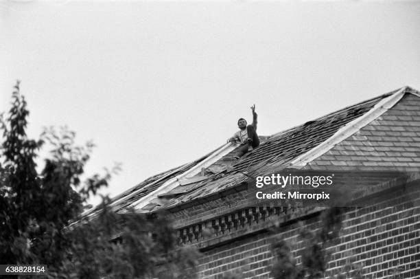 Michael Peterson stages a protest on the roof of Broadmoor Hospital. 20th June 1983.