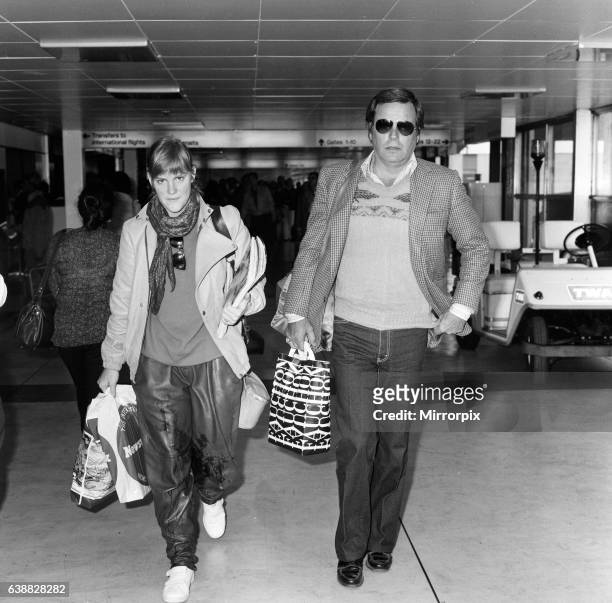 Robert Wagner and his 18-year-old daughter Katie at London Airport to fly to Los Angeles. 30th April 1982.