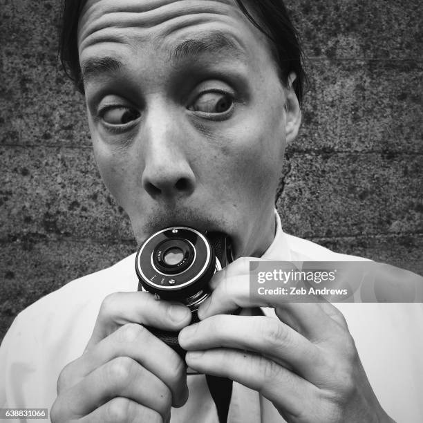 man eating camera - caught in the act stock pictures, royalty-free photos & images