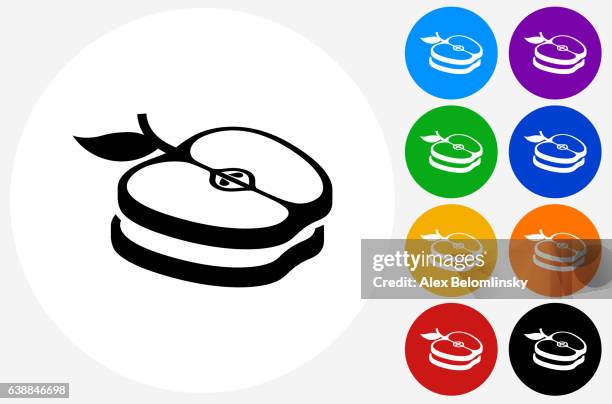 sliced apples icon on flat color circle buttons - green apple slices stock illustrations