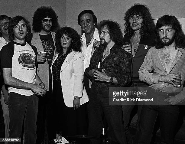 Richard Tandy ELO, Jeff Lynne ELO, Guest, Guest, Kelly Groucutt ELO, Bev Bevan ELO and Mik Kaminski of ELO attend ELO press reception at the...