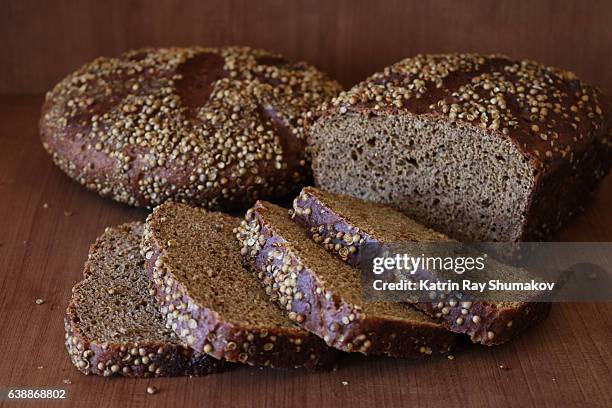 sliced homemade rye breads - rye bread stock pictures, royalty-free photos & images