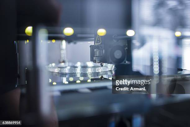 printing 3d object - manufacturing machinery close up stock pictures, royalty-free photos & images
