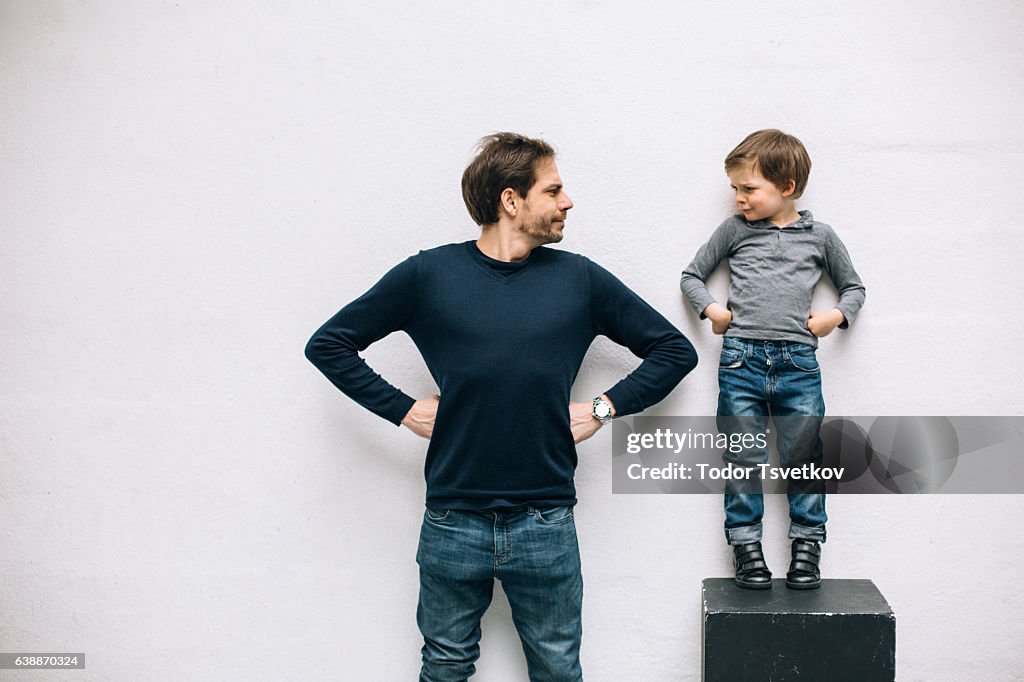 Father and son playing