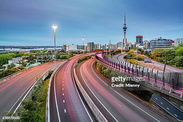 auckland light path bicycle lane highway traffic new zealand - auckland stock pictures, royalty-free photos & images