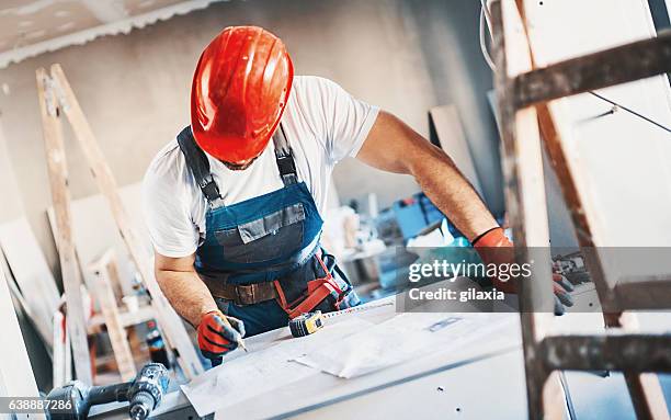 construction worker routine. - arbetsverktyg bildbanksfoton och bilder