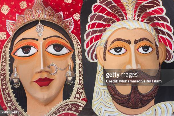portrait of a paper made king and queen on the occasion of celebrating bengali new year - 1423 in dhaka - poila baishakh stock pictures, royalty-free photos & images