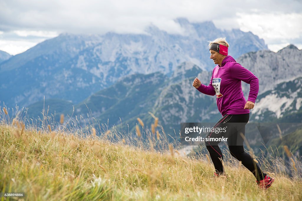 Woman running on mountain